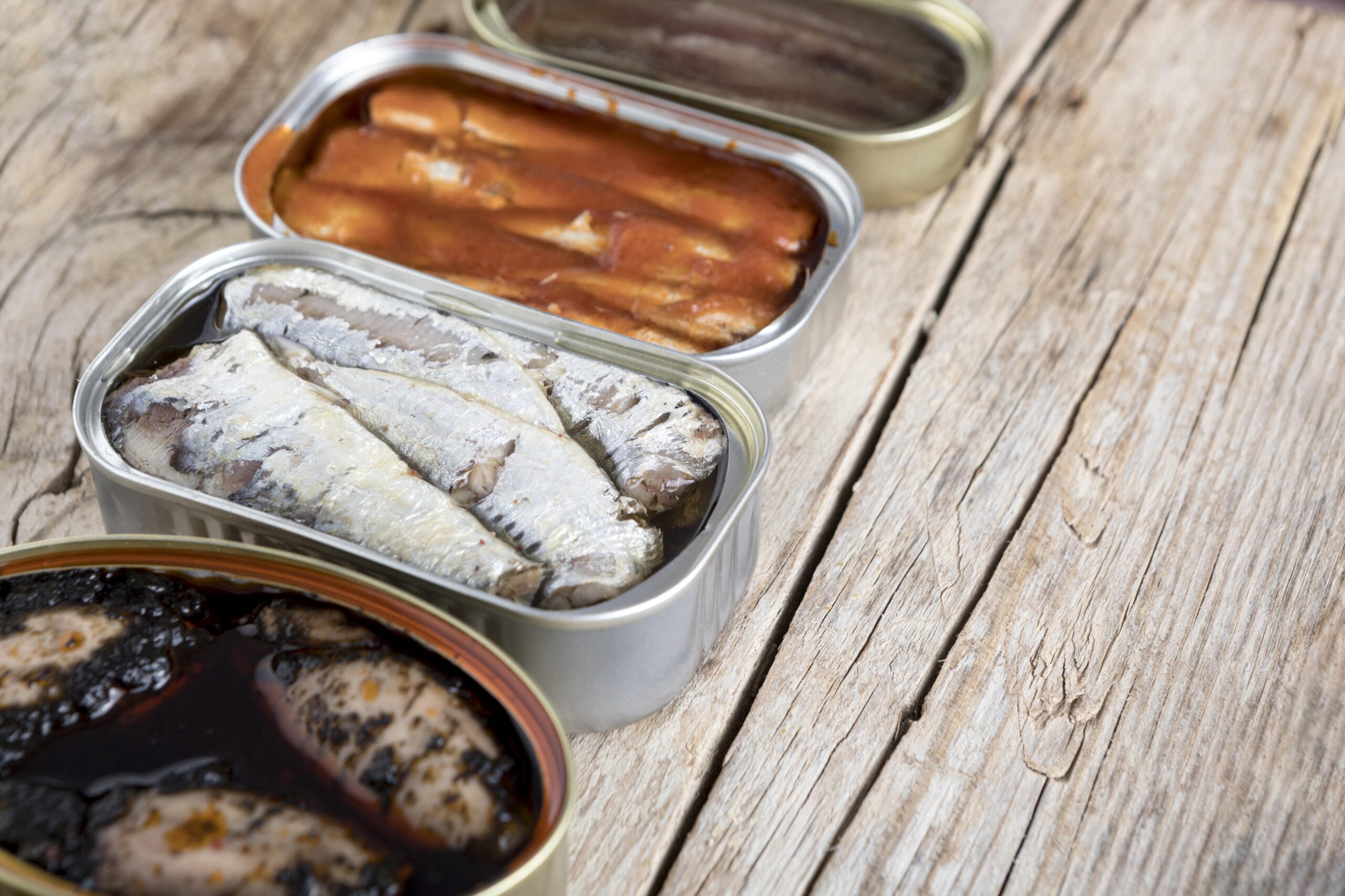 high-angle-cans-with-seafood